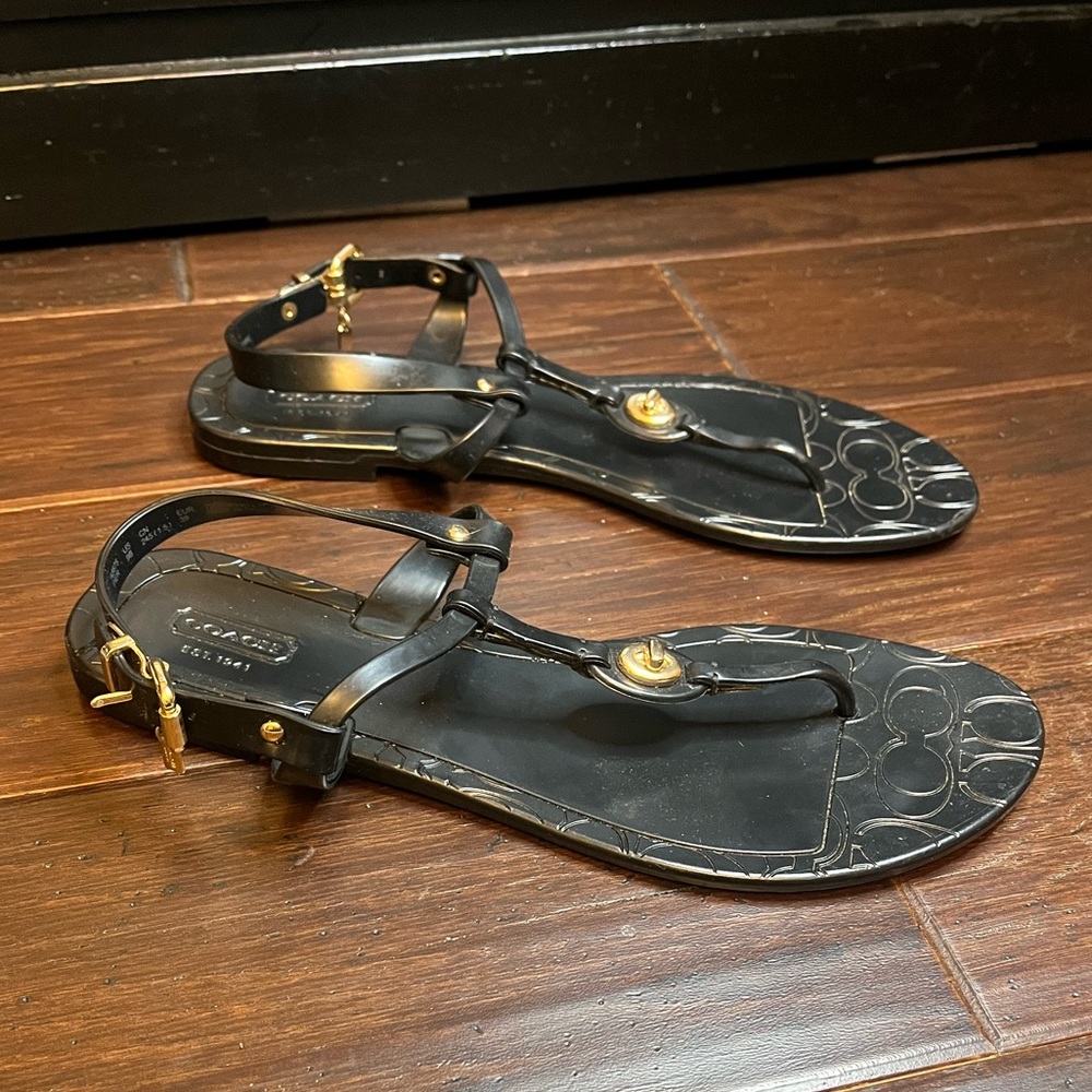 Coach women’s turn lock sandals size 39